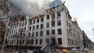 TOPSHOT - The scene of a fire at the Economy Department building of Karazin Kharkiv National University, allegedly hit during recent shelling by Russia, on March 2, 2022. (Photo by Sergey BOBOK / AFP) (Photo by SERGEY BOBOK/AFP via Getty Images)