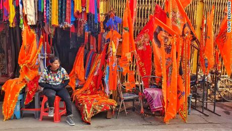 A street vendor sells saffron flags ahead of Uttar Pradesh state elections.