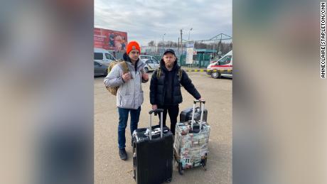 Vasyk Didyk (left) and Igor Shehyni (right) arrive in Ukraine on Wednesday after more than 24 hours of travel from New York. 