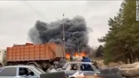 Smoke rises from tire barricades set on fire in Enerhoda, Ukraine, on March 3. 