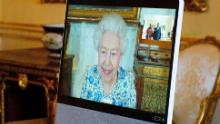 The Queen appears on a screen via videolink from Windsor Castle, during a virtual audience to receive the High Commissioner of Malawi, Dr. Thomas Bisika (not pictured), at Buckingham Palace in London on Thursday.