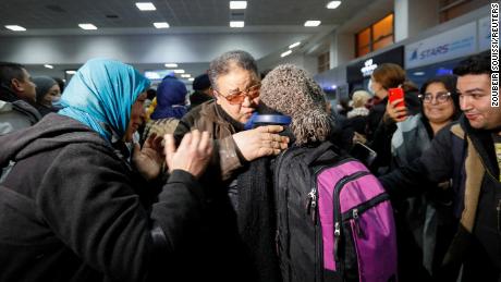 Tunisians who fled to Romania after Russia invaded Ukraine were pictured hugging their tearful loved ones on March 2 as they arrived at the airport in Tunis, the Tunisian capital. 