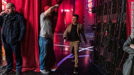 Volodymyr Zelenskiy walks backstage during the filming of his comedy show & # 39; Liga Smeha & # 39;  (League of Laughter) in 2019.