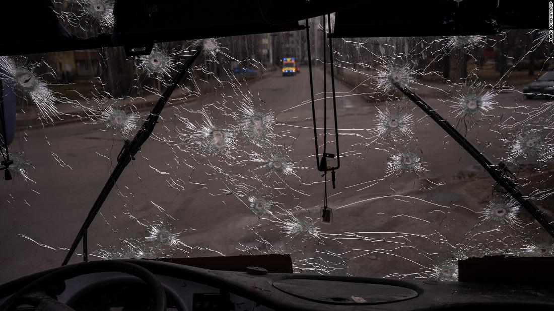 A bullet-ridden bus is seen after an ambush in Kyiv on March 4.