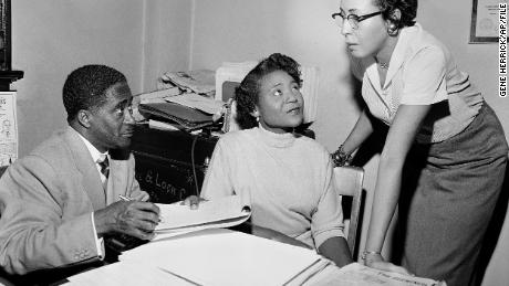 Autherine Lucy Foster, center, was the first Black person to attend University of Alabama in 1956. 