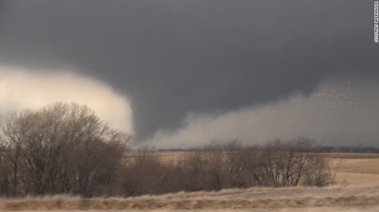 Severe storms move into Arkansas and Missouri after a day of deadly tornadoes in Iowa