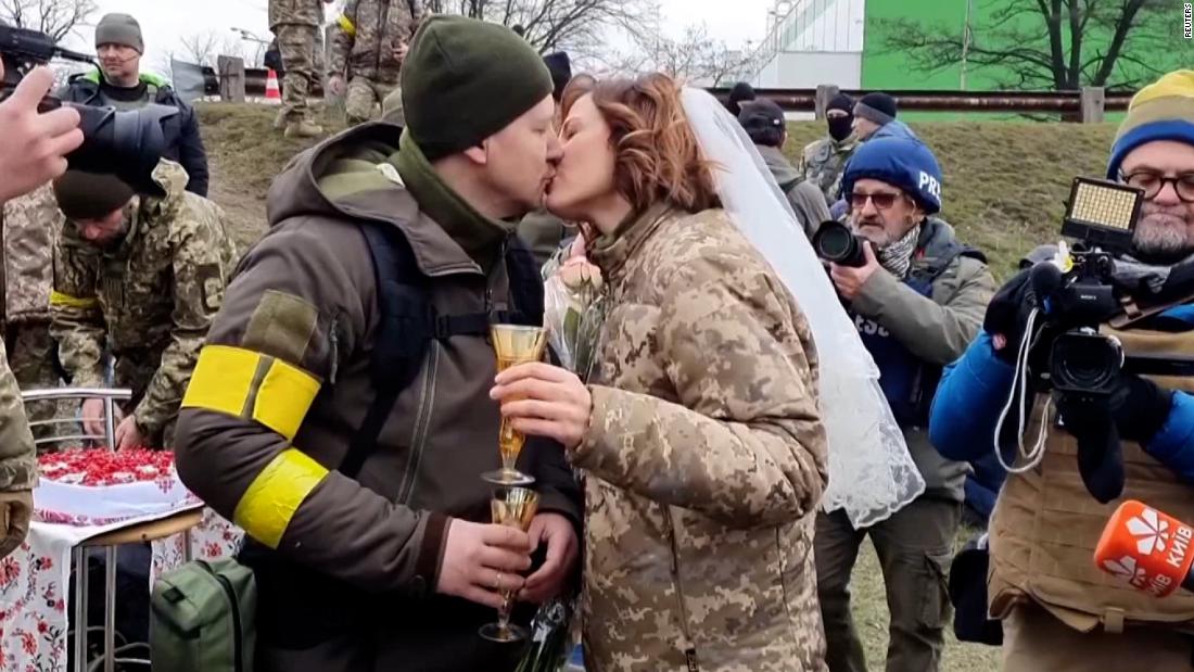 Ukrainian military couple celebrates wedding with camo and cake – CNN Video