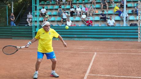 The world&#39;s oldest tennis player Ukrainian Leonid Stanislavskyi, 97, practices on court in Kharkiv, Ukraine July 7, 2021.