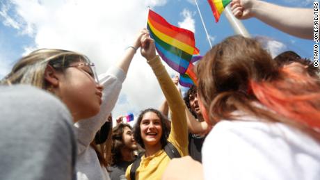 High school students in Tampa, Florida, protest the so-called &quot;Don&#39;t Say Gay&quot; bill on March 3. The bill, which is poised to become law, would prohibit classroom discussion of sexual orientation and gender identity.