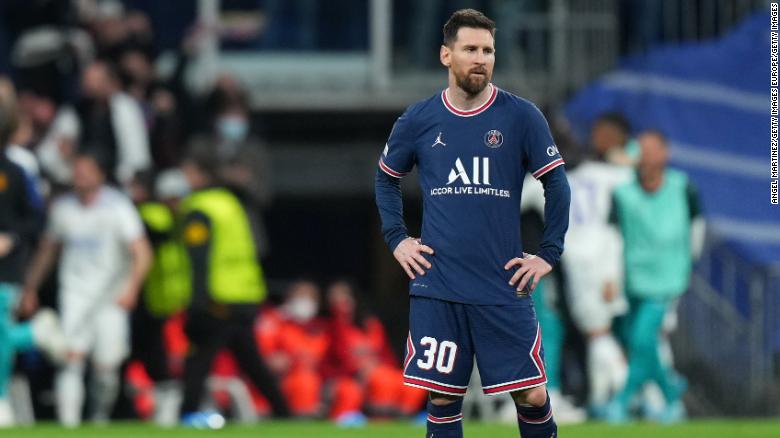 Lionel Messi cuts a dejected figure as PSG lets the lead slip. 
