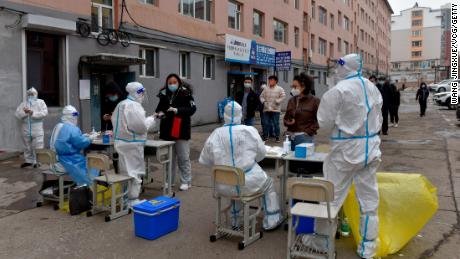 Residents line up for Covid-19 testing on March 10 in China&#39;s Jilin city.