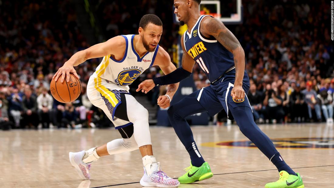 Steph Curry surprises a delighted young fan in the stands - CNN