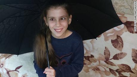 Vika, 10, started having seizures recently, brought on from the stress of the journey out of Ukraine, her mother says. 