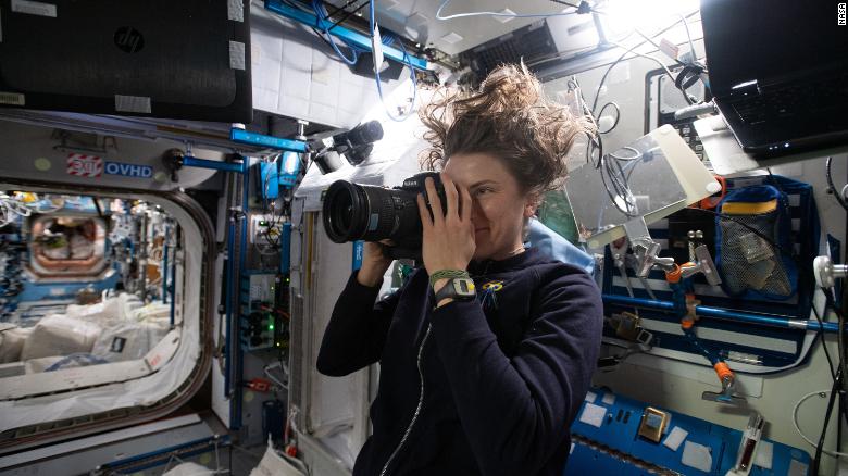 NASA astronaut Kayla Barron takes a photograph of the sample location in the US Node 2 module (Harmony) on the International Space Station for the Sampling Quadrangle Assemblages Research Experiment on January 15.