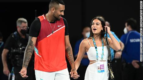 Nick Kyrgios walks with his girlfriend Costeen Hatzi after winning his men&#39;s doubles final with Thanasi Kokkinakis of Australia against Matthew Ebden of Australia and Max Purcell of Australia at the 2022 Australian Open at Melbourne Park.