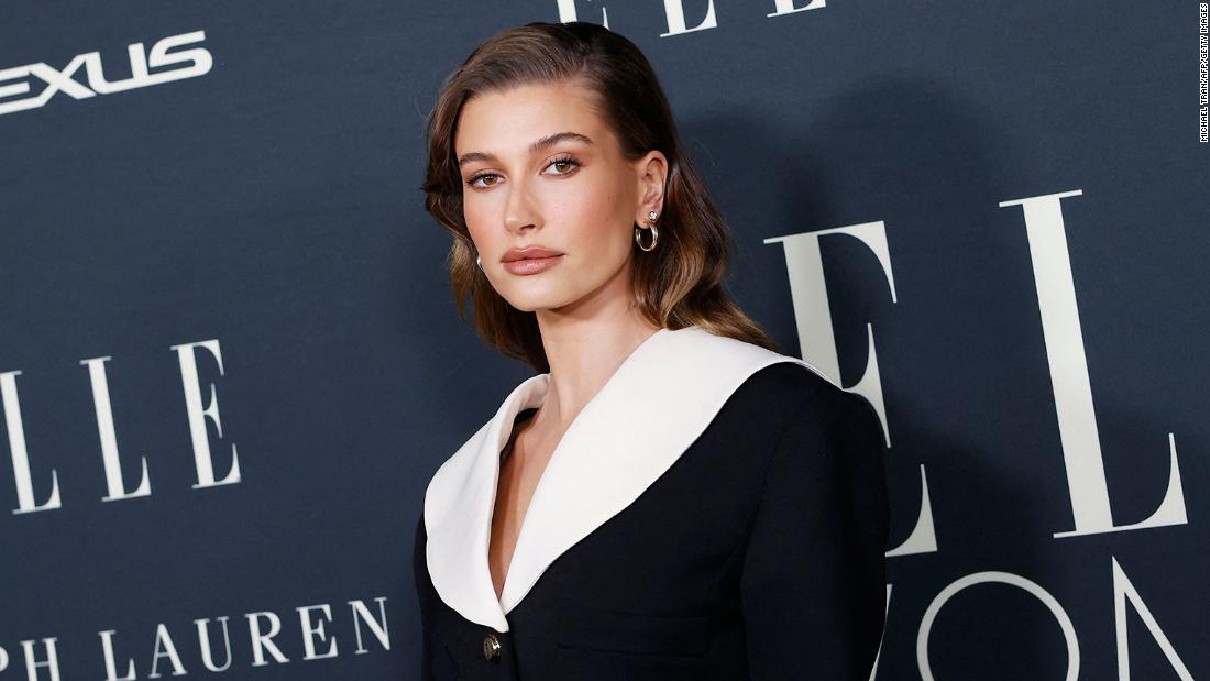 Hailey Bieber says she is home after being hospitalized for a blood clot in her brain