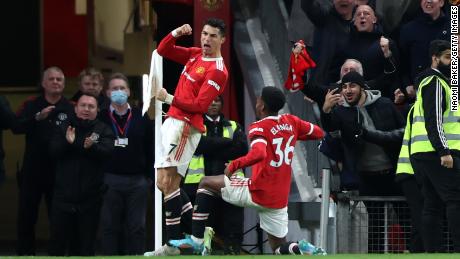 Cristiano Ronaldo celebrates after scoring the third goal during the Premier League match between United and Tottenham at Old Trafford on March 12, 2022.