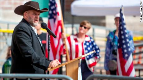 In thiis file photo, Bundy speaks to a crowd of about 50 followers in front of the Ada County Courthouse in Boise on April 3, 2021. 