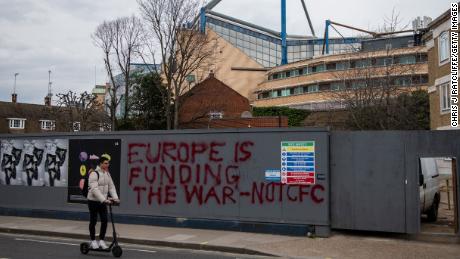 Graffiti is seen on boarding at a construction site next to Chelsea Football Club at Stamford Bridge on March 11.