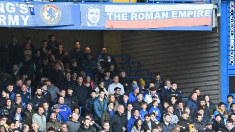 A banner in the colors of Russia&#39;s national flag, and depicting an image of Chelsea&#39;s Russian owner Roman Abramovich, is pictured in the stands on Sunday.