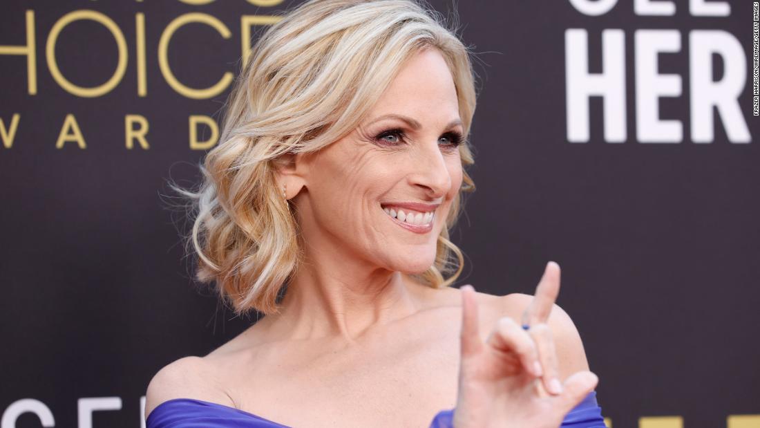 Actress Marlee Matlin uses the sign for &quot;I love you.&quot;