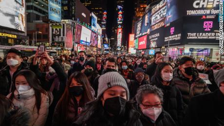 A crowd gathers in New York at a vigil for Michelle Go, who was killed in January after being pushed in front of an oncoming subway train.