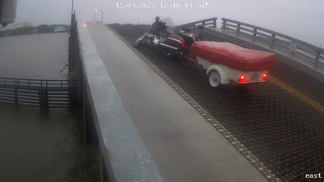 See biker ditch motorcycle before nearly crashing off raised drawbridge – CNN Video