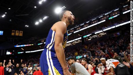 Curry reacts after making a basket and being fouled by the Wizards in the fourth quarter at Chase Center.
