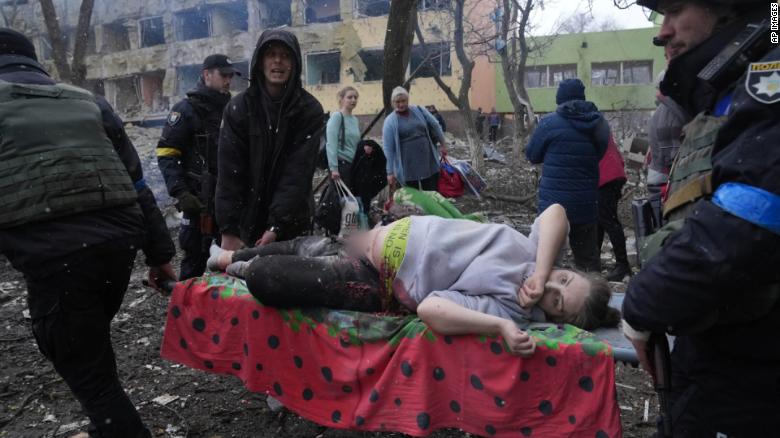 Pregnant woman and her baby die after maternity hospital bombing, Ukraine officials say