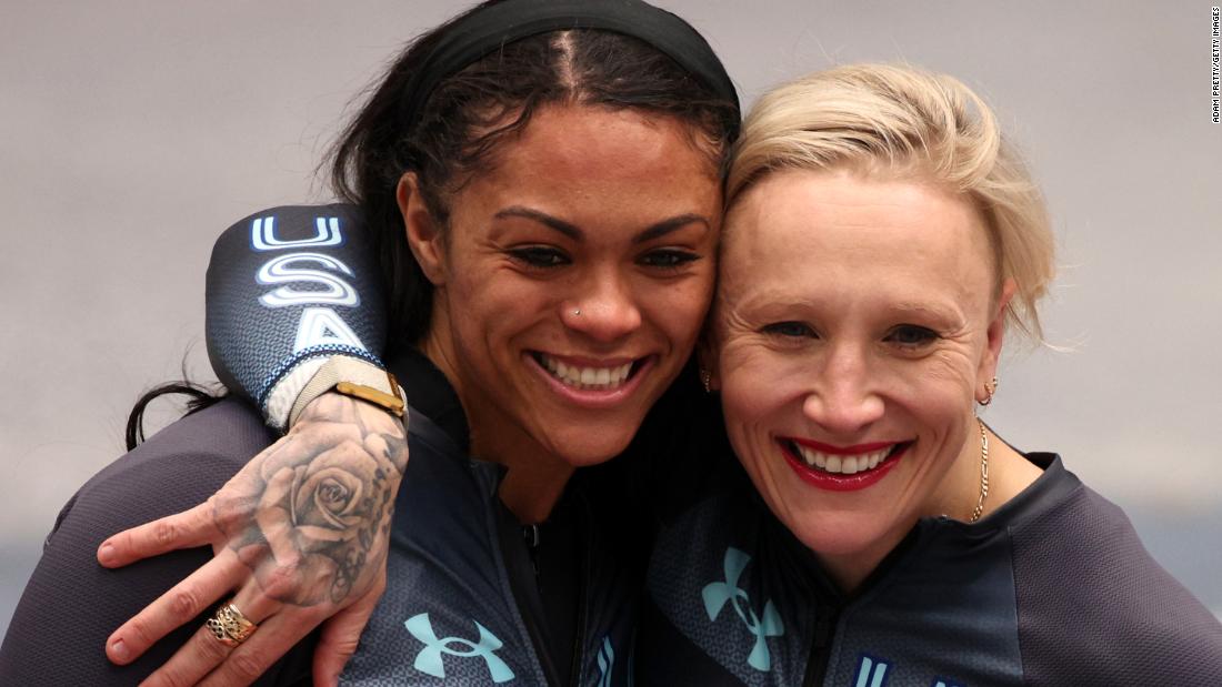 Humphries and Kaysha Love of Team United States celebrate during the 2-woman Bobsled Heat 4 on day 15 of Beijing 2022 Winter Olympic Games on February 19, 2022.