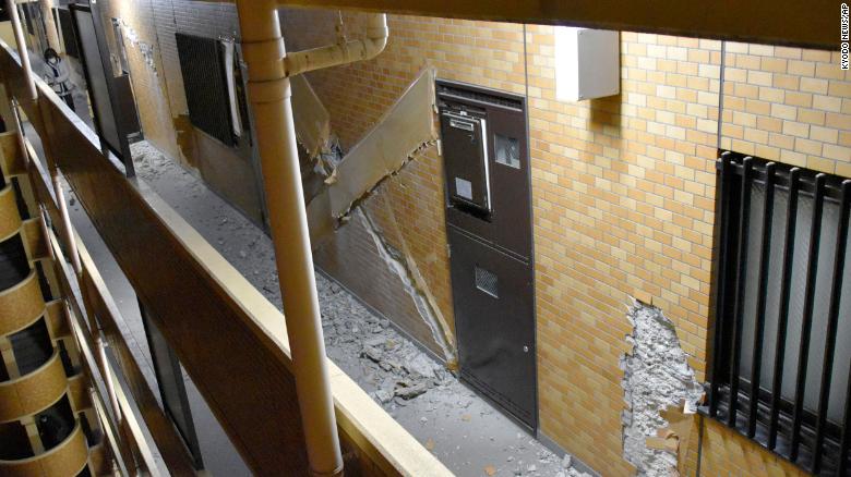 Cracked walls are seen at an apartment building in Fukushima after Wednesday&#39;s quake.