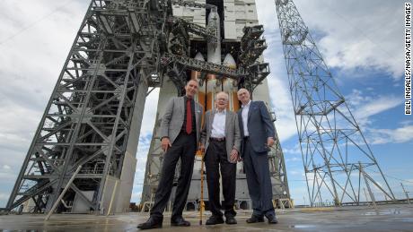 Parker (center) is seen with NASA Associate Administrator for the Science Mission Directorate Thomas Zurbuchen (left) and President and Chief Executive Officer for United Launch Alliance Tony Bruno in front of the ULA Delta IV Heavy rocket with NASA&#39;s Parker Solar onboard on August 10, 2018.