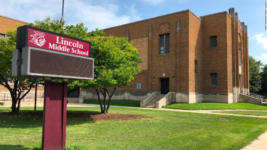 Off-duty officer resigns from school district role after being seen on video putting his knee on the neck of a 12-year-old to break up a fight