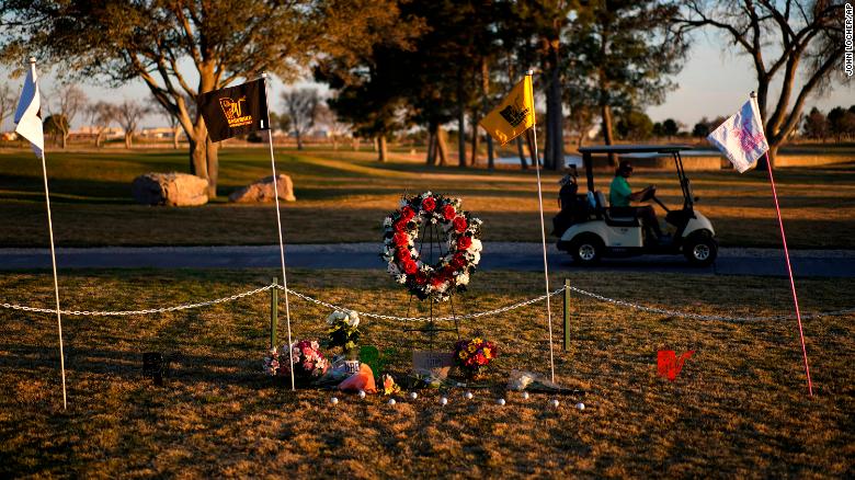 A makeshift memorial was set up at the Rockwind Community Links in Hobbs, New Mexico, Wednesday. 