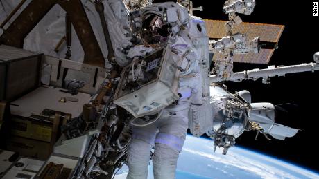 NASA astronaut Raja Chari is pictured tethered to the International Space Station during a six-hour and 54-minute spacewalk on March 15.