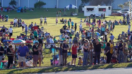 Kennedy Space Center employees and their families gathered to watch the NASA Artemis rocket stack move.