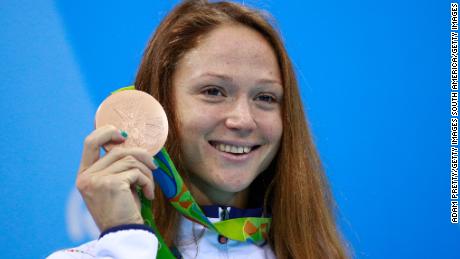 Aliaksandra Herasimenia shows off her bronze on the podium during the medal ceremony for the women&#39;s 50m freestyle final on Day 8 of the Rio 2016 Olympic Games at the Olympic Aquatics Stadium on August 13, 2016 in Rio de Janeiro, Brazil.