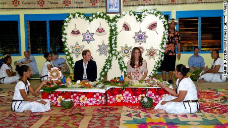 William and Kate attend a traditional dinner in Funafuti, Tuvalu during the couple&#39;s Diamond Jubilee tour of the Far East in September 2012.