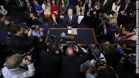 Then-nominee Neil Gorsuch arrives for the first day of his Supreme Court confirmation hearing in March 2017.