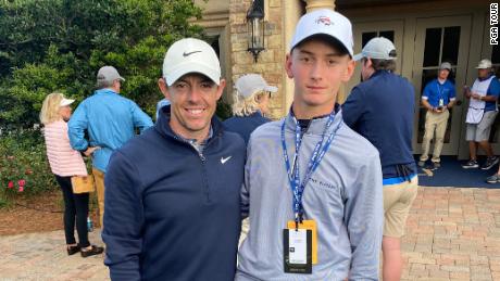 Goldod poses with Rory McIroy during the Players Championship.
