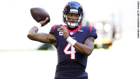 Deshaun Watson participates in warmups prior to a game against the Tennessee Titans at NRG Stadium on January 3, 2021.