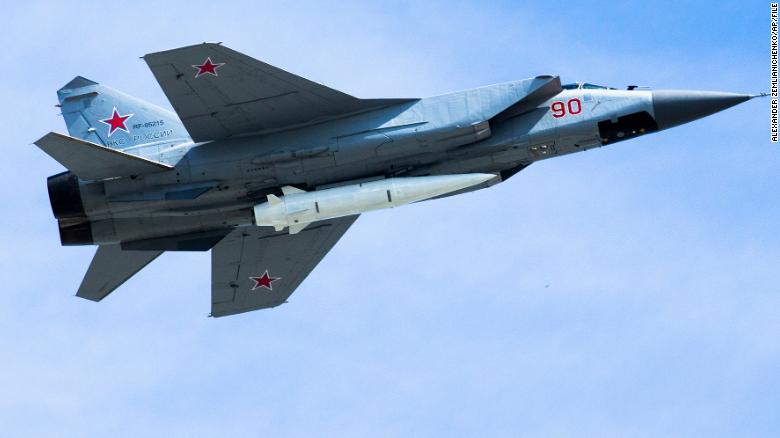 A Russian Air Force MiG-31K jet carries a high-precision hypersonic aero-ballistic missile Kh-47M2 Kinzhal during the Victory Day military parade in Moscow, Russia on May 9, 2018.