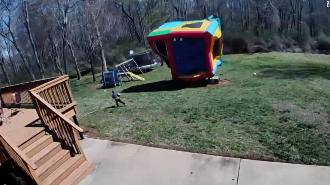 Watch: Flying bounce house narrowly misses hitting 5-year-old – CNN Video