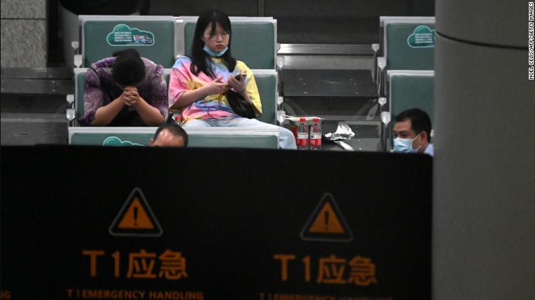 Relatives of passengers on China Eastern flight MU5375 at the holding area of Guangzhou Baiyun International Airport on March 22.