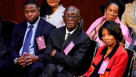 The family of Supreme Court nominee Justice Ketanji Brown Jackson, from left, his brother Ketajh Brown and his parents Johnny and Ellery Brown, sit together in the front row during Jackson's confirmation hearing before the commission judicial of the Senate on Monday, March 21.  , 2022, on Capitol Hill in Washington. 