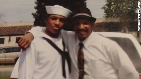 Justin, left, and his father Maurice Peoples in Waukegan, Illinois, at Navy graduation.