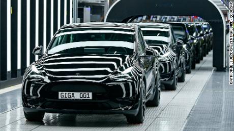 Model Y electric vehicles stand on a conveyor belt at the opening of the Tesla factory near Berlin earlier this month.