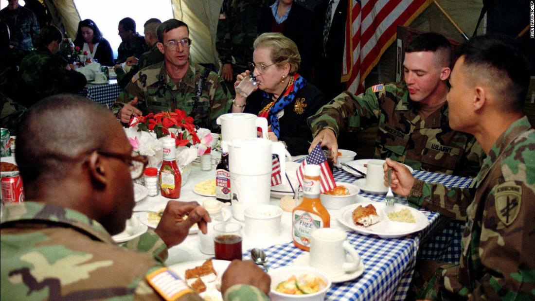 Albright has lunch with US troops serving in Bosnia in 1997.