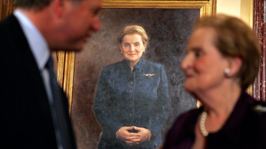 Albright speaks to a guest at the unveiling of her official portrait in Washington, DC, in 2008.