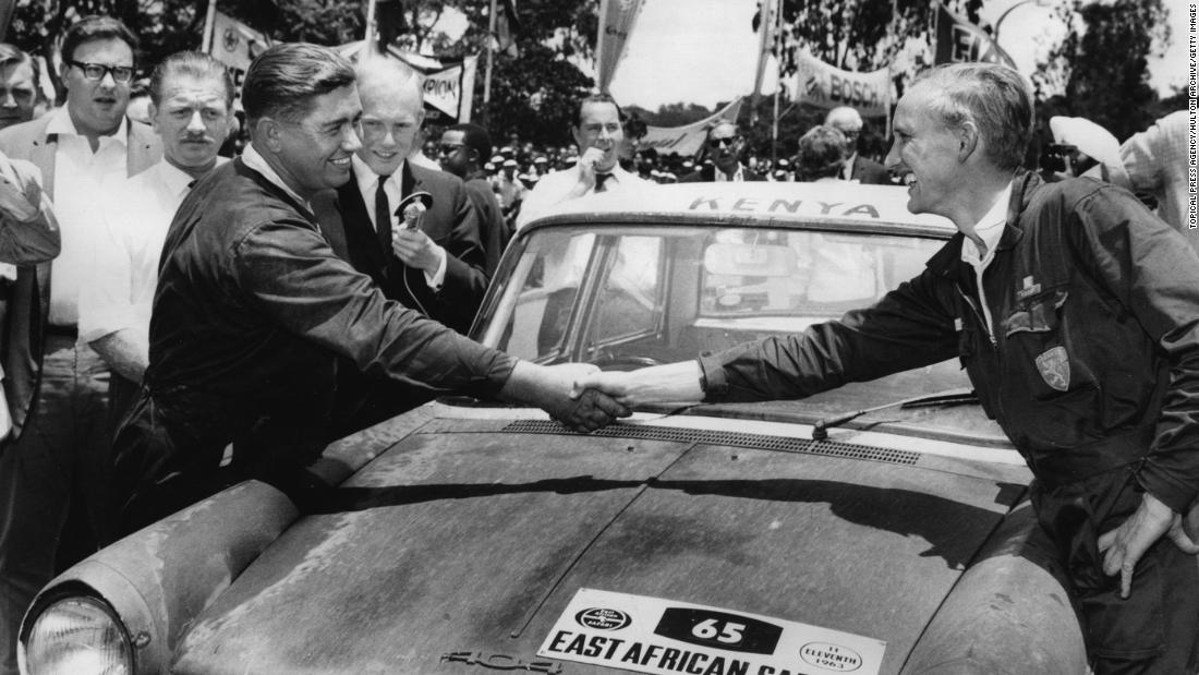 The Coronation Rally changed its name to the East African Safari Rally in 1960. Pictured: 1963 East African Safari winners Nick Nowicki and Paddy Cliffe shake hands over the bonnet of their Peugeot car.  